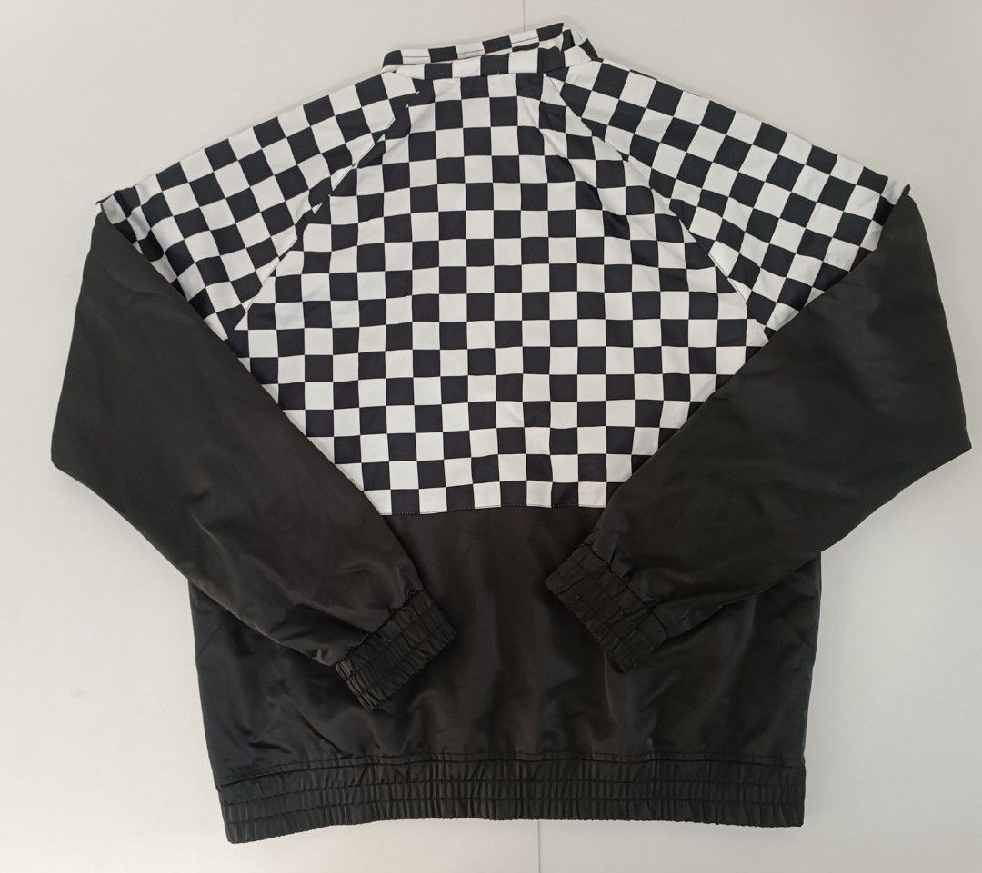 Forever 21 Checkerboard Jacket (Category: Activewear) located in Mandaluyong City. Submitted by bethco (Listing ID 1403632843, Image 2). Description: - Forever 21 jacket - Black and white checkerboard upper and sleeves - Solid black lower section - Full zip closure - Stand-up collar - Elastic cuffs and hem - Lined for warmth and comfort.