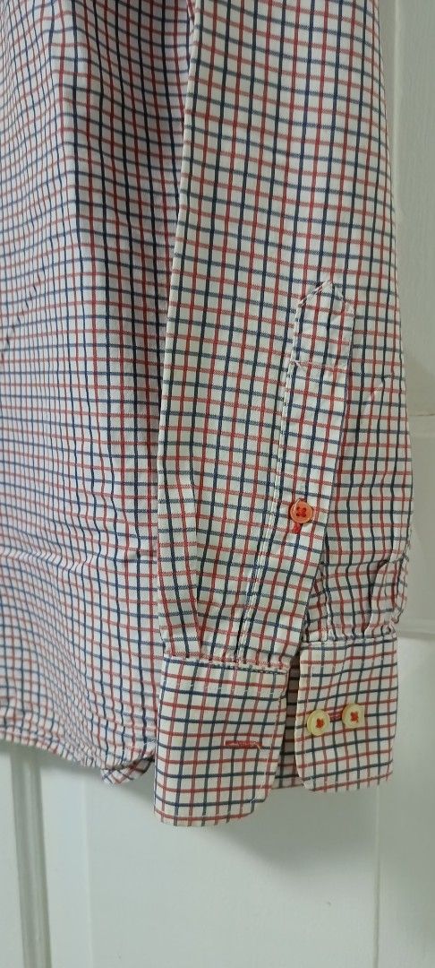 H&M Checkered Long Sleeve Shirt (Category: Tshirts & Polo Shirts ) located in Paranaque City. Submitted by yesyesyo (Listing ID 1403707032, Image 3). Description: Stylish long-sleeved shirt from H&M. Features a classic checkered pattern in red, blue, and white. It has a button-down front and cuffs. The shirt has a collared neckline and a tailored fit. Perfect for both casual and semi-formal occasions. this is not thrifted. all are for personal de