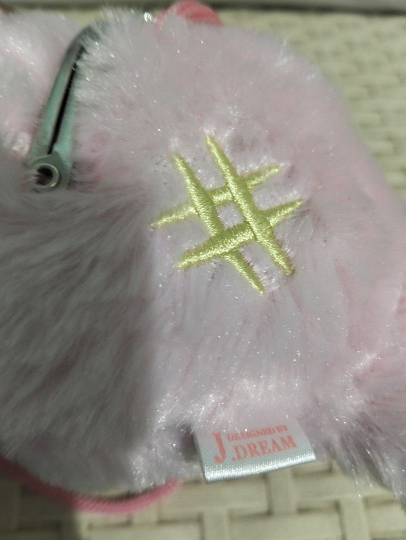 j.dream Shark Kisslock Bag (Category: Cross-body Bags) located in Gasan. Submitted by AngeliqueKaye (Listing ID 1403731570, Image 3). Description: Adorable J.Dream shark kisslock bag. Features a pink, fluffy exterior with large black eyes and a kisslock closure. Includes a pink strap for easy carrying. The bag has a pink interior and a cute tail design. Perfect for carrying small essentials. The bag has a small embroidered detail on the side..
