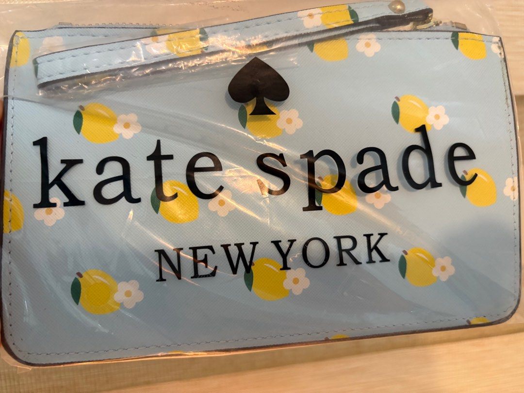 Kate Spade New York Wristlet (Category: Luxury Bags & Wallets) located in Taguig. Submitted by wountersdam (Listing ID 1403661299, Image 2). Description: Kate Spade New York wristlets with fruit patterns. Each wristlet has a zipper closure and a wrist strap. The wristlets come in various colors and fruit designs, including lemons and peaches. -small and slim - can only fit bills, coins, cards, small items - Class A - bundle only PHP1000 for 3 - g