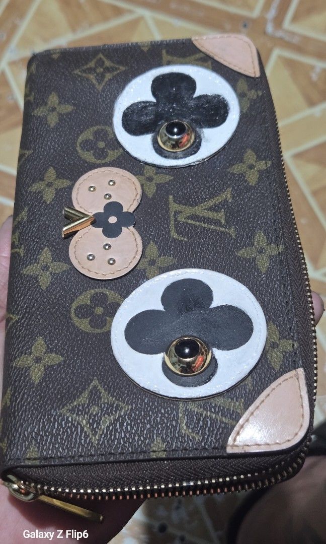 Louis vuitton (Category: Luxury Bags & Wallets) located in Manila. Submitted by ritzselect26 (Listing ID 1403769082, Image 1). Description: authentic limited edition lv "puppy dog valentine" zippy wallet in brown monogram issue-repaint yun black, white & pink na color nag melt kas pero same color but not expert sa restoration mop-gcash/paymaya courier-jrs/jnt/lalamove.