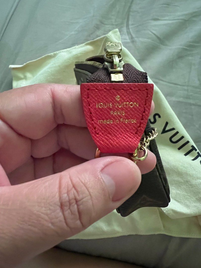Louis Vuitton Mini Pochette Accessoires London (Category: Luxury Bags & Wallets) located in Manila. Submitted by lesly.lising (Listing ID 1403642965, Image 3). Description: 15.5 x 10.5 x 4 cm (Length x Height x Width) Monogram / Candy Red Coated canvas Cowhide-leather trim Textile lining Gold-toned hardware metallic zip closure Chain with hook Chain: Not removable Chain Drop: 15.0 cm Made in France.