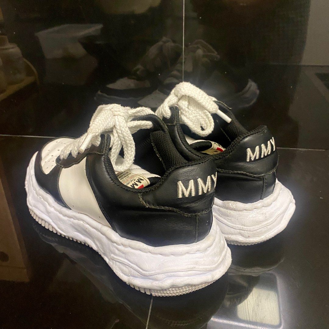 MMY Wayne Sneakers - Black and White (Category: Sneakers) located in Manila. Submitted by seramisu (Listing ID 1400225406, Image 2). Description: MMY Wayne sneakers in black and white. Features a unique wavy sole design. The shoes have white laces and the MMY logo is visible on the tongue and heel. Size 41. The inner sole has a tag that says "Sublime meets Ridiculous". Authentic Slightly used.