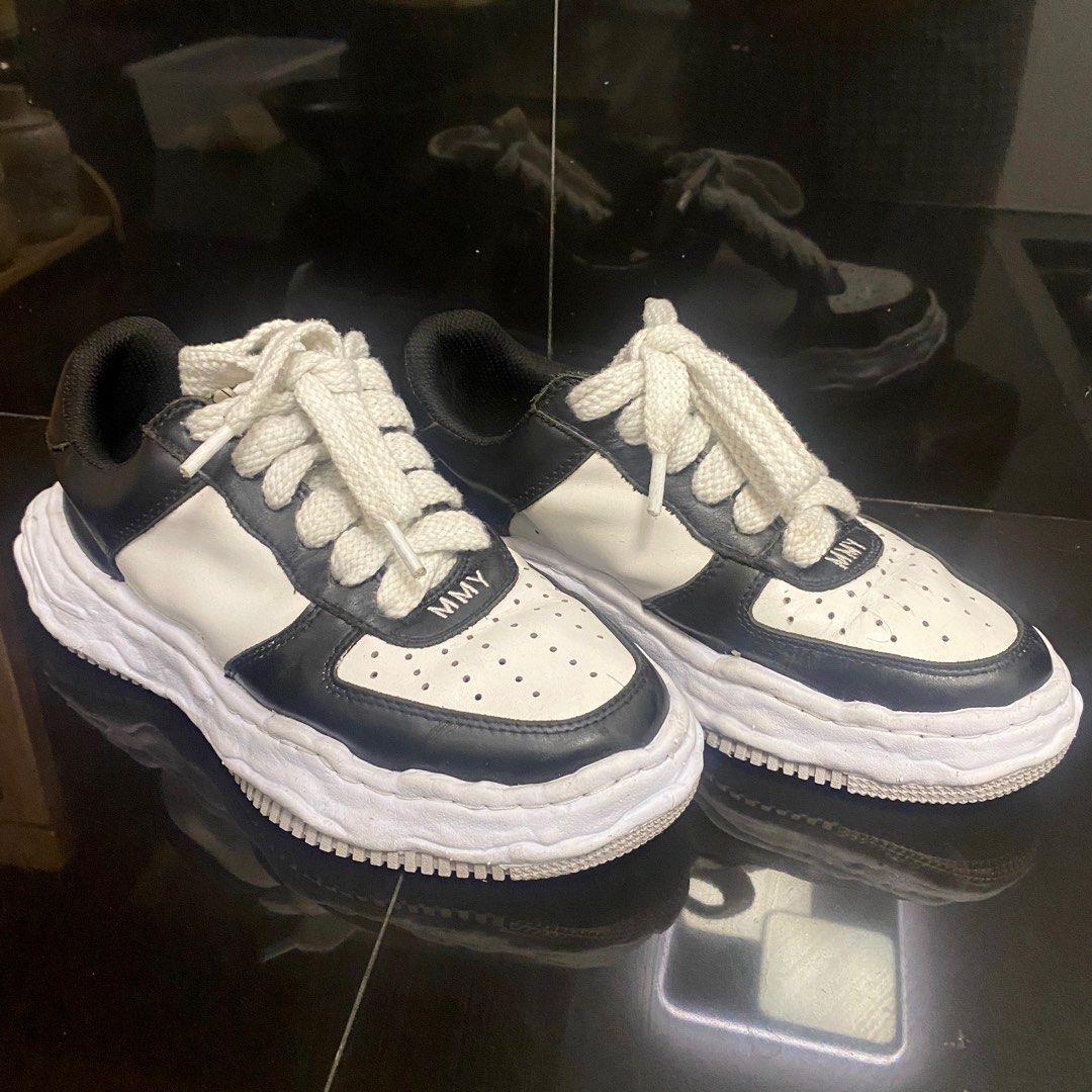 MMY Wayne Sneakers - Black and White (Category: Sneakers) located in Manila. Submitted by seramisu (Listing ID 1400225406, Image 1). Description: MMY Wayne sneakers in black and white. Features a unique wavy sole design. The shoes have white laces and the MMY logo is visible on the tongue and heel. Size 41. The inner sole has a tag that says "Sublime meets Ridiculous". Authentic Slightly used.