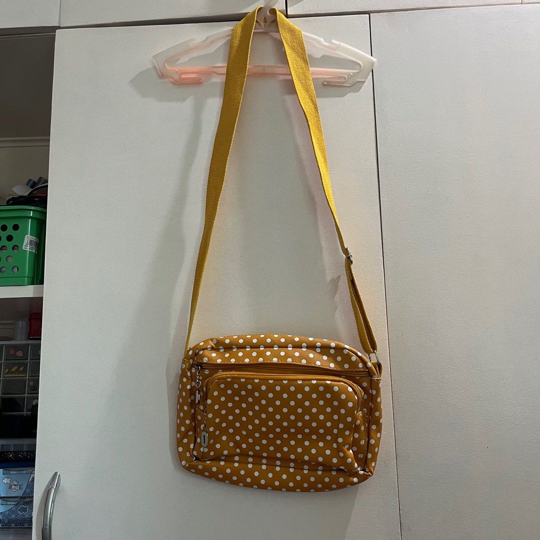 Mustard Yellow Polka Dot Shoulder Bag (Category: Shoulder Bags) located in Pasig City. Submitted by beabimbop (Listing ID 1403649061, Image 2). Description: 💛 Minor flaws (strap is a bit dirty, but it’s washable) 💛 Owned this for many years but rarely lang nagamit 💛 Price is negotiable 🏷️ Tags: shoulder bag, sling bag, polka dots, mustard bag, retro bag, kipling bag .