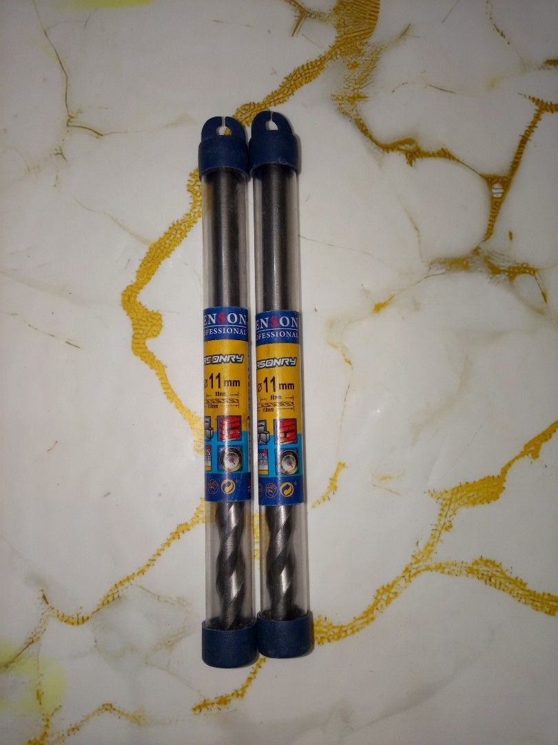 Neon Infinity 11mm Drill Bit (Category: Construction Tools & Equipment) located in Rizal. Submitted by baifern37813 (Listing ID 1403670146, Image 1). Description: - Two Neon Infinity 11mm drill bits - Designed for professional use - Each bit comes in a clear plastic tube with blue caps - Features the Neon Infinity logo and product information on the packaging.