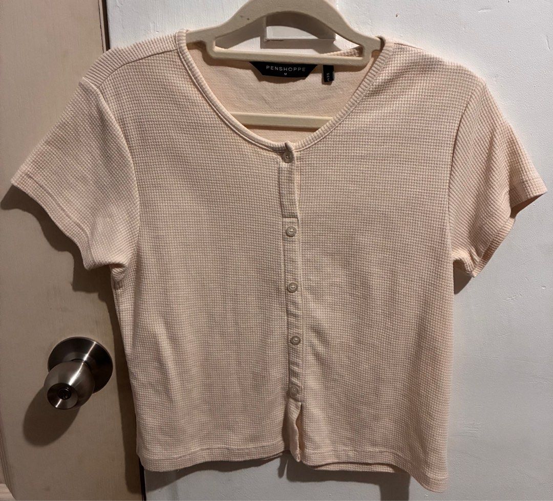 Penshoppe waffle tee (Category: Blouses) located in San Fernando. Submitted by julieloops (Listing ID 1403703952, Image 1). Description: beige actual color Medium on tag rfs: decluttering, moving abroad .