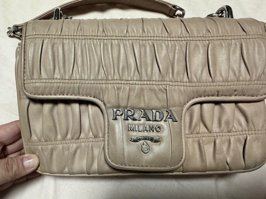 PRADA Bag (Authentic) (Category: Luxury Bags & Wallets) located in Mandaluyong City. Submitted by richelle_22 (Listing ID 1403739011, Image 1). Description: authentic; some parts recolored; PRADA Gaufre Sling & Shoulder Bag.