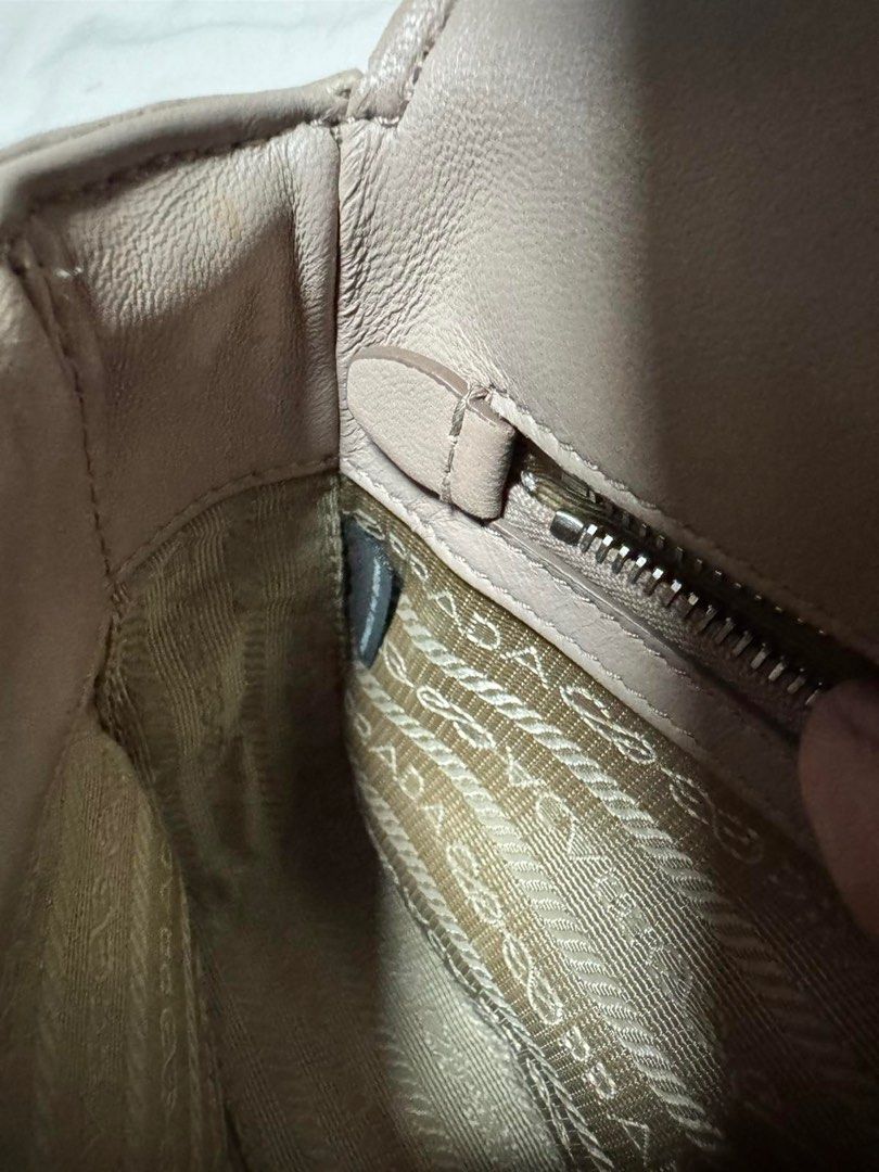 PRADA Bag (Authentic) (Category: Luxury Bags & Wallets) located in Mandaluyong City. Submitted by richelle_22 (Listing ID 1403739011, Image 3). Description: authentic; some parts recolored; PRADA Gaufre Sling & Shoulder Bag.