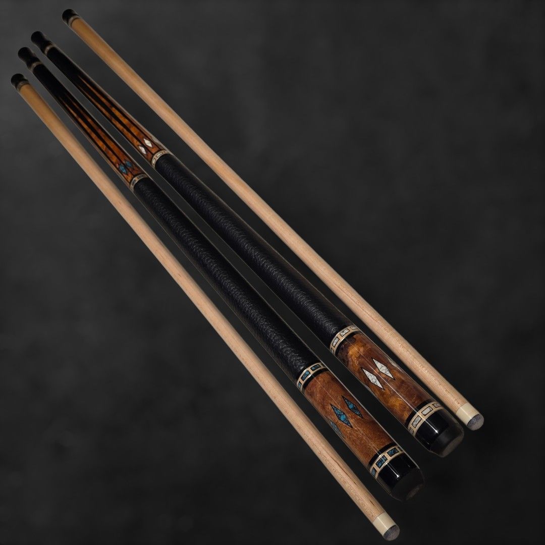 Prototype custom pool cues (Category: Billiards & Bowling) located in Singapore. Submitted by buganeal (Listing ID 1403786596, Image 1). Description: Hi guys! Up for grabs are 2 custom cues. These cues were part of our RnD process cues( materials matching) , they are full customs and are new and unplayed. They may however have very minor scratches or blemishes as they were test pieces ( artist proof). Both cues are share black stained maple forea