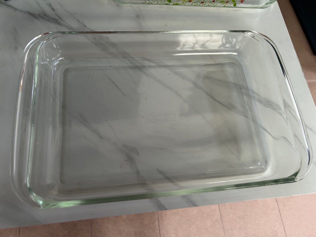 Pyrex Rectangular Serving Dish (Category: Bakeware) located in Subang Jaya. Submitted by cupcake05 (Listing ID 1403684021, Image 1). Description: Oven, Microwave - Dishwasher safe Size 33cm x 23cm Good condition Can be used as serving or baking 2 pcs available.
