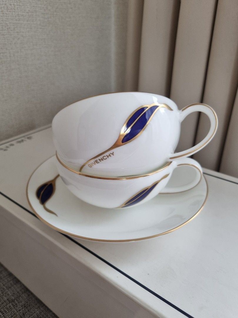 Rare Givenchy Widemouth Blue Leaf Tea Cup Set (Category: Coffee & Tea Tableware) located in Porac. Submitted by tokyohome (Listing ID 1403679921, Image 1). Description: Rare Givenchy Widemouth Blue Leaf Tea Cup Set Php 700 only / set 1 set = 1 cup + 1 saucer Php 4000 only / take all At its best price On hand 🎌Hard to find set 🎌 6 sets available 🎌 Unused, take all with box 🎌 cup (w 9.8 x h 4.5cm) saucer (15.3cm) # 106 #givenchyphilippines #giv