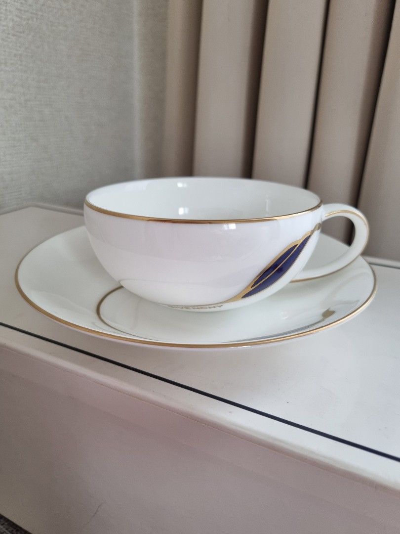 Rare Givenchy Widemouth Blue Leaf Tea Cup Set (Category: Coffee & Tea Tableware) located in Porac. Submitted by tokyohome (Listing ID 1403679921, Image 2). Description: Rare Givenchy Widemouth Blue Leaf Tea Cup Set Php 700 only / set 1 set = 1 cup + 1 saucer Php 4000 only / take all At its best price On hand 🎌Hard to find set 🎌 6 sets available 🎌 Unused, take all with box 🎌 cup (w 9.8 x h 4.5cm) saucer (15.3cm) # 106 #givenchyphilippines #giv