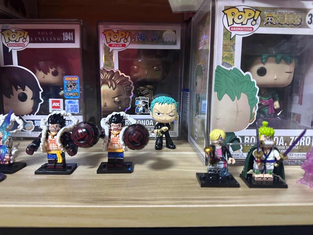 S> One Piece custom Minifig (Category: Toys & Games) located in Singapore. Submitted by sungjinwoo92 (Listing ID 1403766363, Image 2). Description: - One Piece custom mini figure collection. $5.50 each ! Can nego ! Zoro Luffy sanji ! .