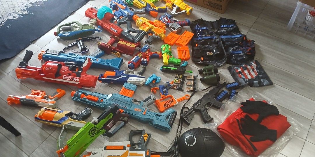 Take all Gun Collection with squid game costume (Category: Action & Battle Toys) located in Manila. Submitted by lyfransanci (Listing ID 1403622981, Image 3). Description: - Assorted gun collection mostly nerf. -24pcs -squid game costume size: M - Includes various models and sizes. - Comes in multiple colors - Some guns include magazines. - Ideal for Nerf enthusiasts and collectors. Costume w/ gun - 650 3 Big gun - 800 each 1 Nerf gun white - 650
