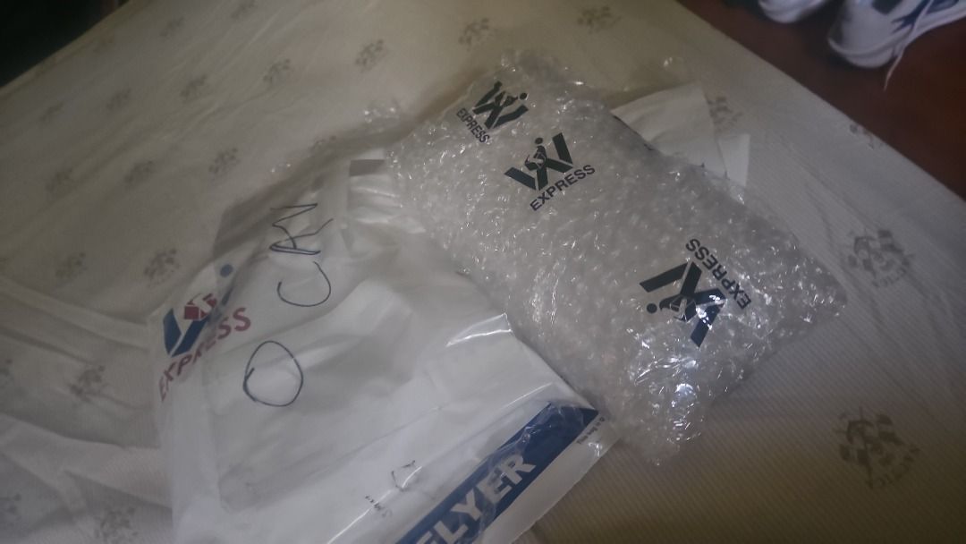 WX Express Package smart locked (Category: iPhone 17 Series) located in Manila. Submitted by say.say (Listing ID 1403669078, Image 1). Description: - Sealed package - Bubble-wrapped for protection - Features WX Express logo - In a plastic flyer bag - Ready for delivery.