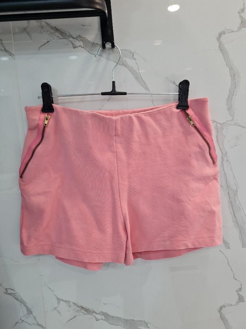 Zara Pink Shorts with Zippers (Category: Shorts) located in San Juan City. Submitted by rwongthings (Listing ID 1403645330, Image 1). Description: - Zara pink shorts - Size: L/MEX30 - Features: Side zippers and a small zippered pocket - Color: Solid pink - Made in Portugal.