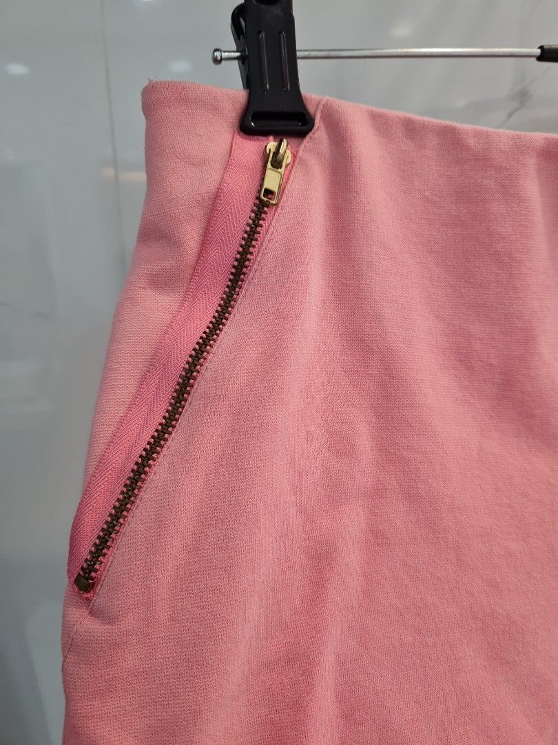 Zara Pink Shorts with Zippers (Category: Shorts) located in San Juan City. Submitted by rwongthings (Listing ID 1403645330, Image 3). Description: - Zara pink shorts - Size: L/MEX30 - Features: Side zippers and a small zippered pocket - Color: Solid pink - Made in Portugal.