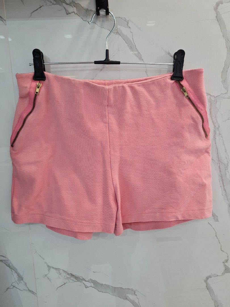 Zara Pink Shorts with Zippers (Category: Shorts) located in San Juan City. Submitted by rwongthings (Listing ID 1403645330, Image 2). Description: - Zara pink shorts - Size: L/MEX30 - Features: Side zippers and a small zippered pocket - Color: Solid pink - Made in Portugal.