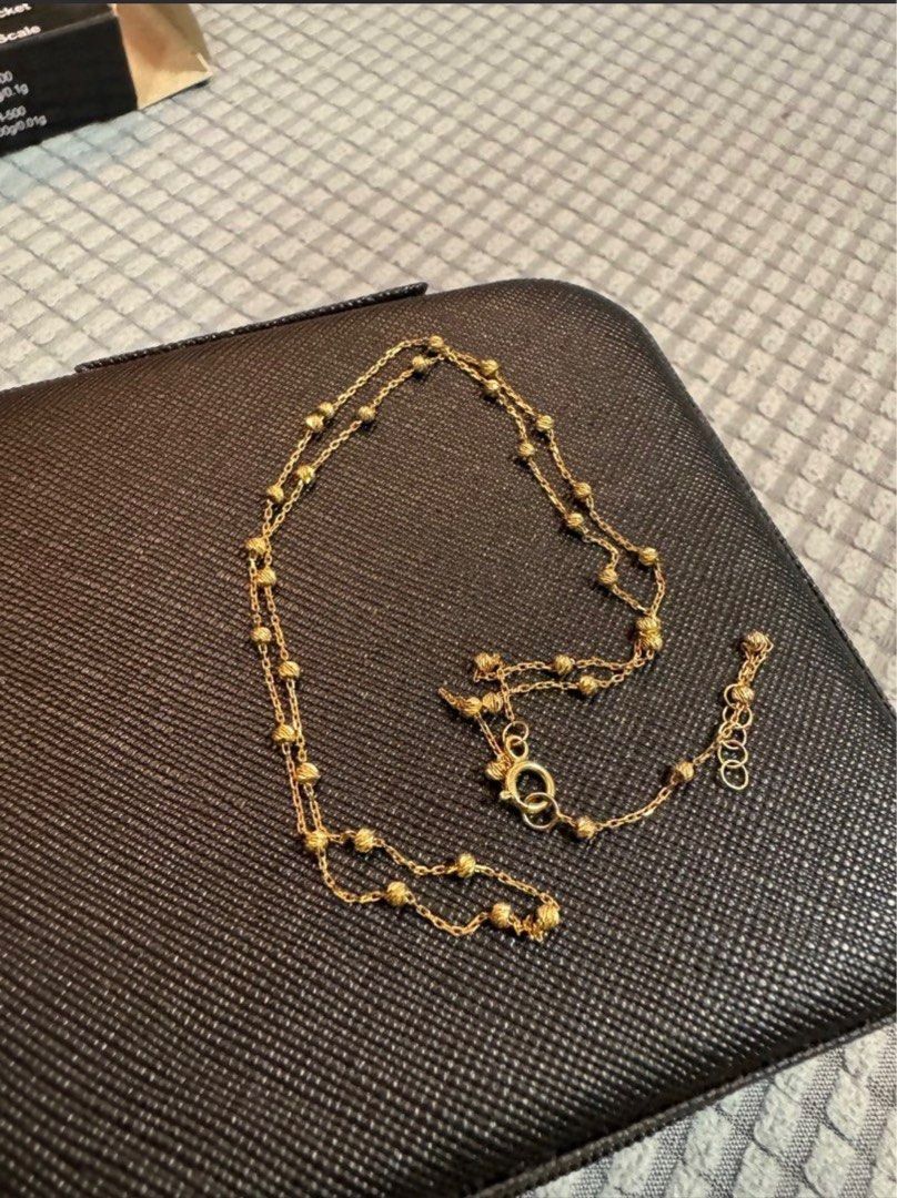 18k Gold Beaded Necklace (Category: Necklaces) located in Angat. Submitted by maureenbr0208 (Listing ID 1403992985, Image 1). Description: - Delicate gold necklace - Beaded design - Weight: 2.06 grams - Length: Approximately 20 inches - Clasp visible in image - Simple and elegant - Suitable for everyday wear or special occasions.