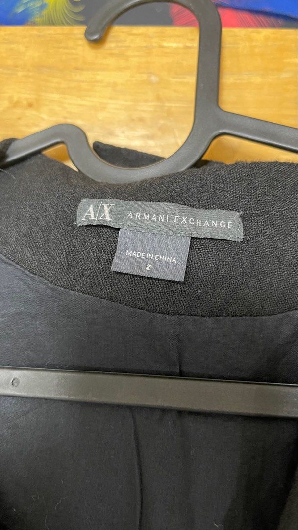 A/X Armani Exchange Black Dress Size 2 (Category: Dresses) located in Makati City. Submitted by sellonlineph (Listing ID 1403810334, Image 3). Description: - Original Armani Exchange black dress - Size 2, can fit small to medium - Front zipper closure - Short sleeves - Unique ruffled design - Two front pockets - No belt (I lost it) .