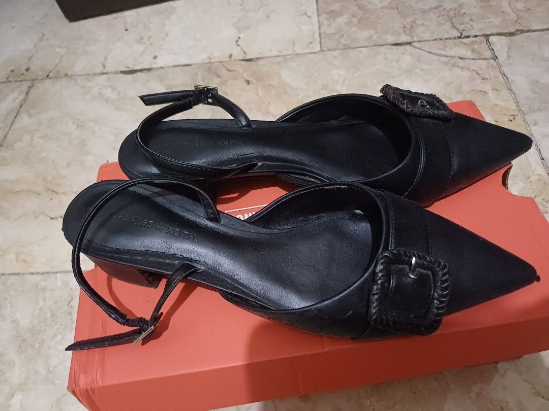 Charles & Keith Kitten Heels (Category: Flats & Sandals) located in Quezon City. Submitted by declutterhouse (Listing ID 1403911191, Image 2). Description: - Charles & Keith black pointed sandals - Size 37 - Buckle detail and ankle strap - Black color - Signs of wear on soles - Authentic - Would rather keep than lowball as it's a fave - Super comfy to wear as in to malls everywhere they feel like flats ! - Well used but good condition. No issue..