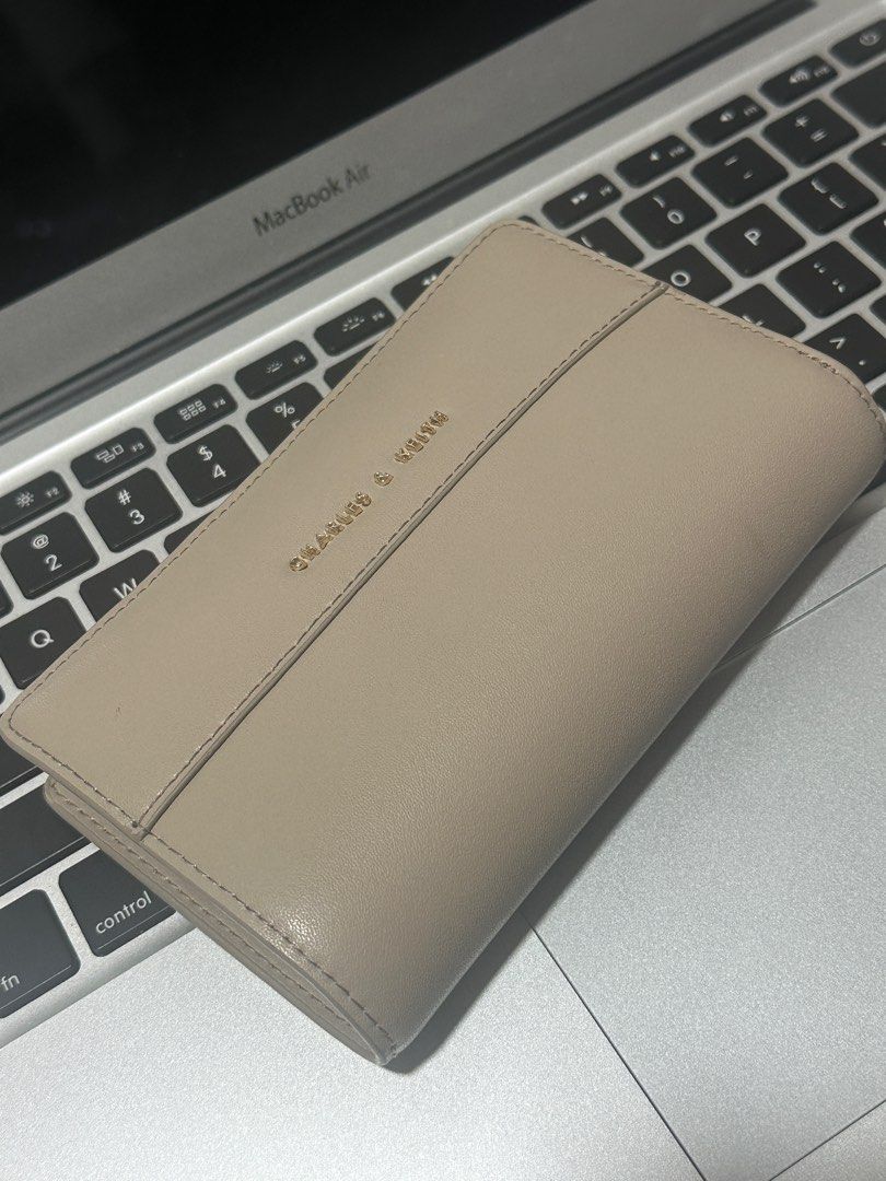 Charles & Keith Wallet (Category: Wallets & Card holders) located in Binan City. Submitted by wednesjay (Listing ID 1403847163, Image 1). Description: - bought for 1,999 php - comes w the box, paper bag, and receipt! - see photos for signs of usage RFS: not my aesthetic anymore .