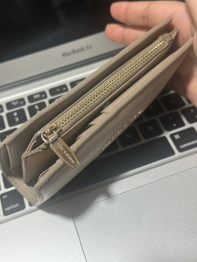 Charles & Keith Wallet (Category: Wallets & Card holders) located in Binan City. Submitted by wednesjay (Listing ID 1403847163, Image 2). Description: - bought for 1,999 php - comes w the box, paper bag, and receipt! - see photos for signs of usage RFS: not my aesthetic anymore .