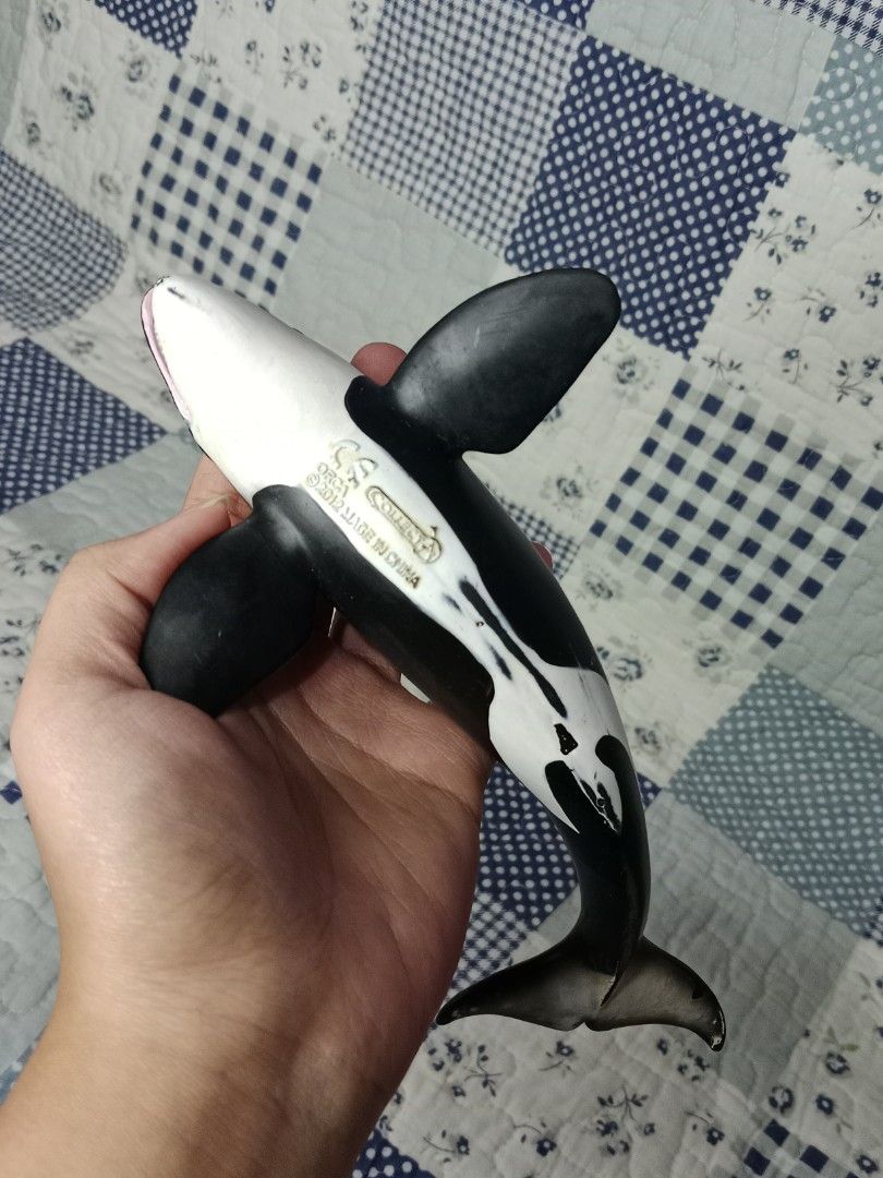 CollectA Orca Killer Whale Toy (Category: Figurines & Statues) located in Baguio. Submitted by zosathaluchar12 (Listing ID 1403978905, Image 2). Description: - CollectA Orca killer whale toy - Detailed black and white design - Features a detailed mouth and fins - Marked "ORCA 2012 MADE IN CHINA" on the underside - Great for display or play!.