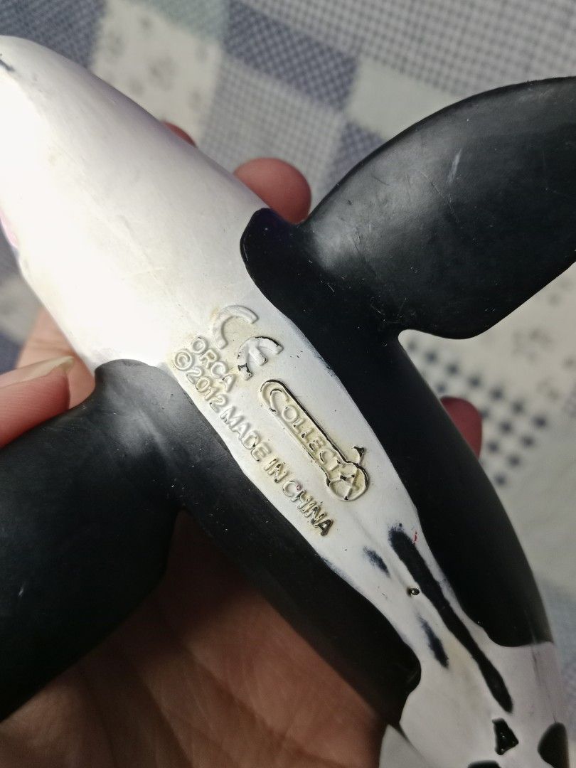 CollectA Orca Killer Whale Toy (Category: Figurines & Statues) located in Baguio. Submitted by zosathaluchar12 (Listing ID 1403978905, Image 3). Description: - CollectA Orca killer whale toy - Detailed black and white design - Features a detailed mouth and fins - Marked "ORCA 2012 MADE IN CHINA" on the underside - Great for display or play!.