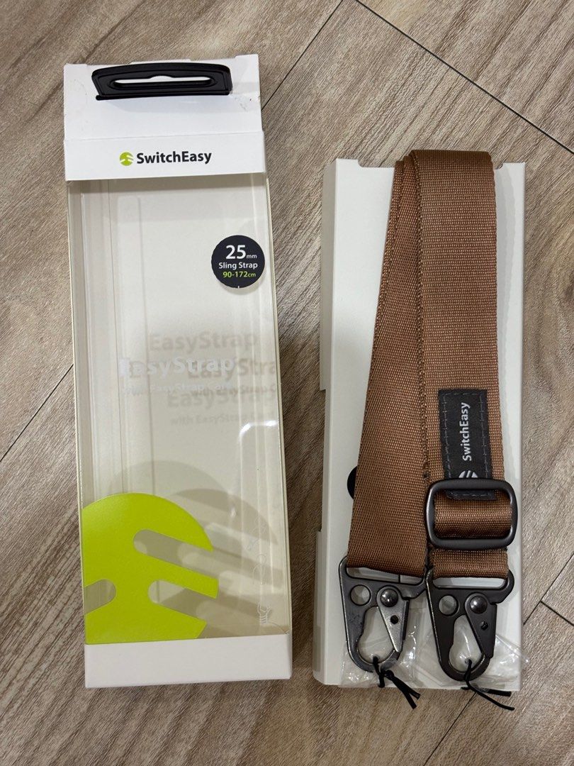 EasyStrap phone lanyard (Category: Other Accessories) located in Bayan Lepas. Submitted by unlimited_noname (Listing ID 1403949755, Image 2). Description: The black holding piece is a little bit torn but the inner part is still alright..