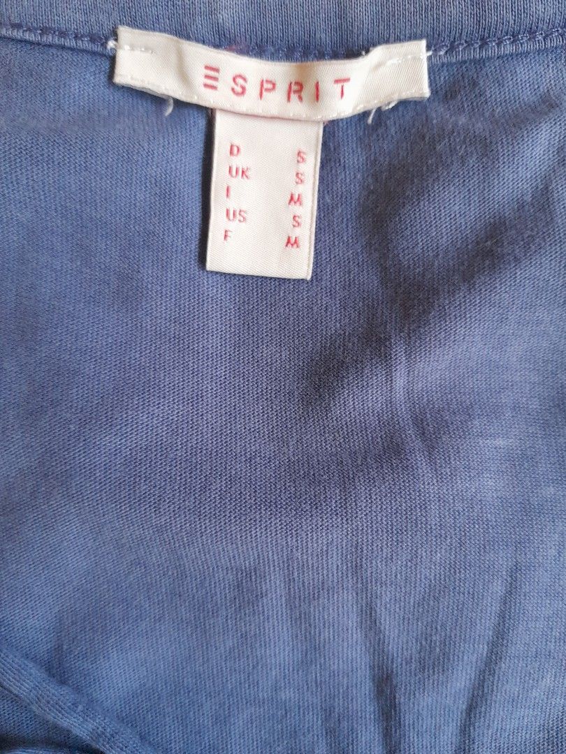 Esprit Embroidered blouse (Category: Blouses) located in San Pedro. Submitted by JohnsonKeeps (Listing ID 1403843797, Image 3). Description: - Esprit blouse - Blue color - V-neck with tie detail - Delicate embroidery around neckline - Size M - flaws, small hole at the front bottom (see picture).
