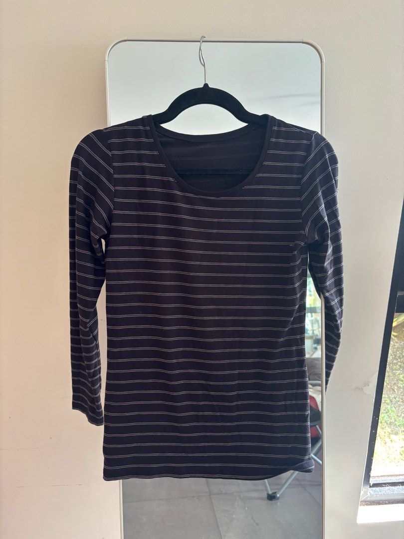 Extra Warm Uniqlo heat tech longsleeves (Category: Longsleeves) located in Mandaluyong City. Submitted by dmpsy (Listing ID 1403888497, Image 2). Description: Fits small-medium Great inner but also wear them as it is.