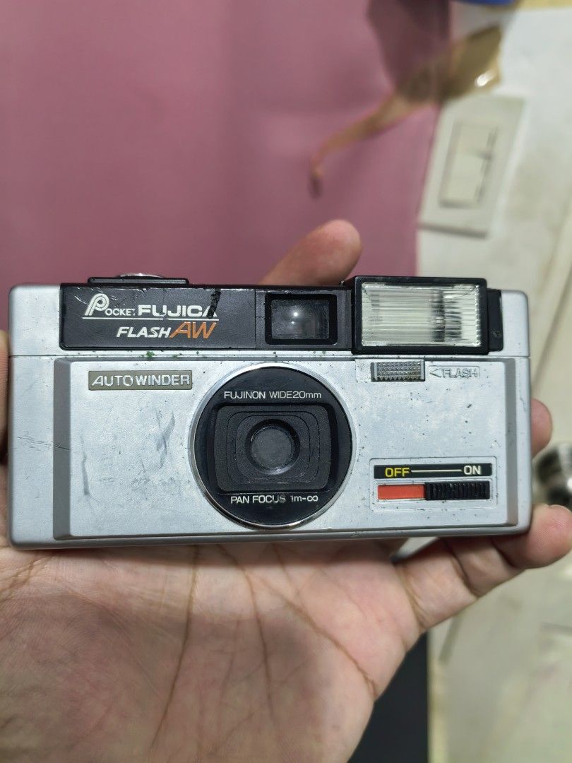 Fuji Pocket Fujica Flash AW (Category: Cameras) located in Cebu City. Submitted by dudes_villanueva (Listing ID 1403825777, Image 2). Description: Fuji Pocket Fujica Flash AW Note: Tested Non-Functional See All photos for condition. Sold as is. All sales final and non-refundable. For Restoration, collection, or parts. 📌A 110 film camera from the 1980s. It has a built-in flash and a motor-driven film advance, which was unusual for 110 film camera