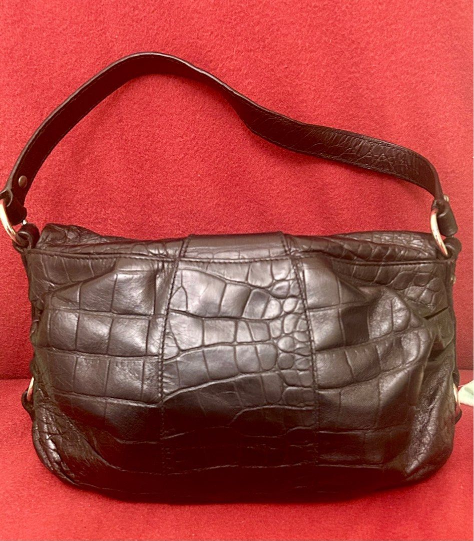 Furla Black Croc-Embossed Shoulder Bag (Category: Luxury Bags & Wallets) located in Quezon City. Submitted by asiaco (Listing ID 1403835487, Image 3). Description: - Authentic Furla shoulder bag - Black croc-embossed leather exterior - Silver-tone clasp and hardware - Black and white polka dot fabric lining - Single shoulder strap - Furla logo detail - Made in Italy -hardwares need polishing.