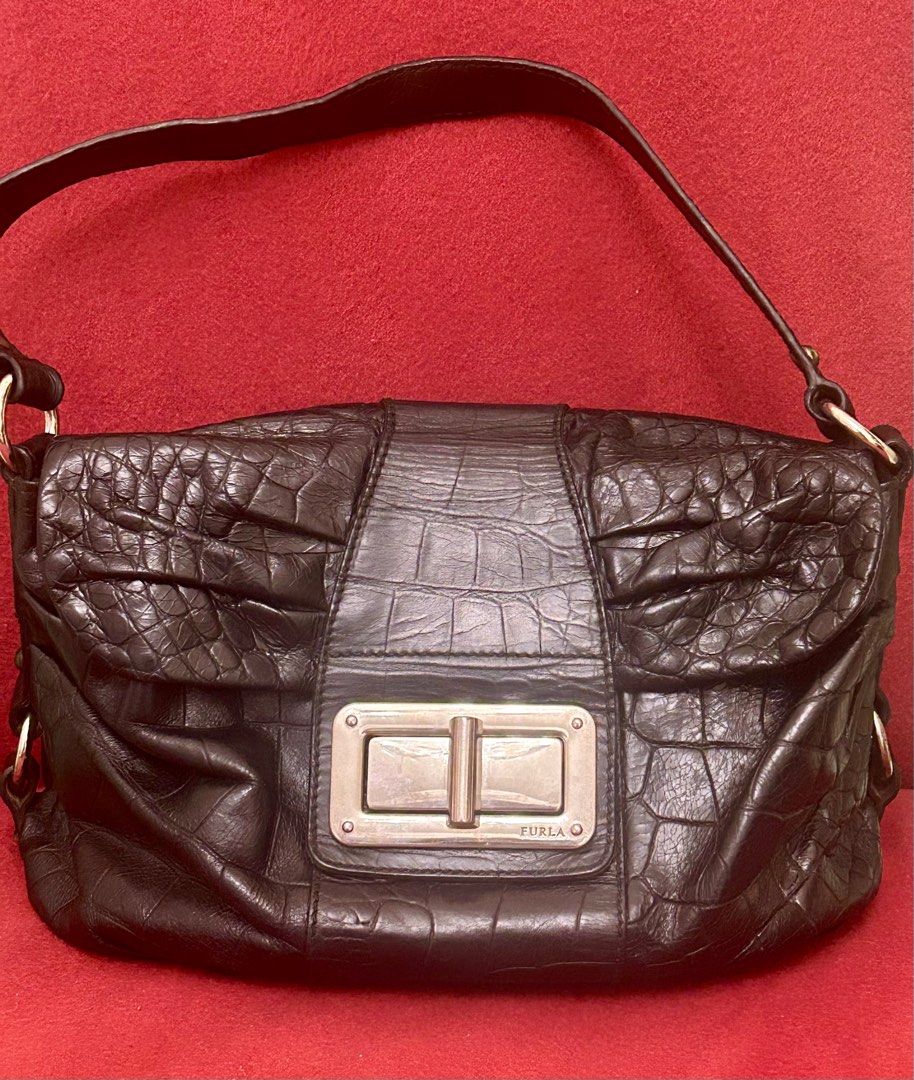Furla Black Croc-Embossed Shoulder Bag (Category: Luxury Bags & Wallets) located in Quezon City. Submitted by asiaco (Listing ID 1403835487, Image 1). Description: - Authentic Furla shoulder bag - Black croc-embossed leather exterior - Silver-tone clasp and hardware - Black and white polka dot fabric lining - Single shoulder strap - Furla logo detail - Made in Italy -hardwares need polishing.