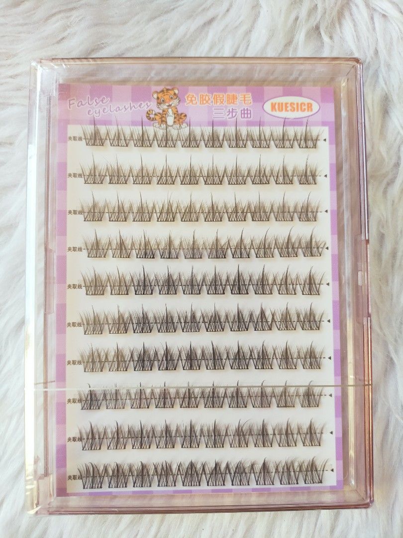 Glue Free Cluster Eyelashes (Category: Makeup) located in Quezon City. Submitted by floreskari78555 (Listing ID 1403847697, Image 3). Description: Glue Free Cluster Eyelashes‼️ Instead of using a separate glue, the base of the lash clusters has a medical-grade, sticky adhesive already applied. You simply use tweezers to place the cluster directly onto your natural lash line, pressing it against the lash base. no mess✅ beginner friendly✅ easy remo