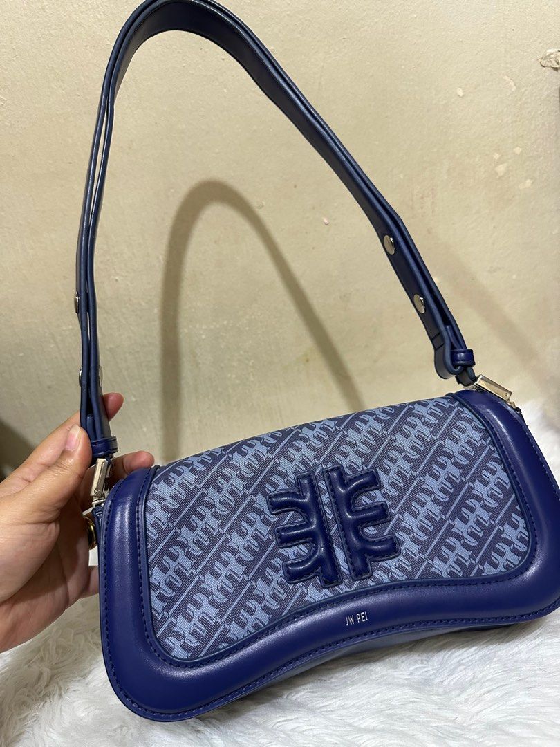 JW Pei (Category: Luxury Bags & Wallets) located in San Jose del Monte. Submitted by iamloved_items (Listing ID 1403965349, Image 1). Description: Almost new!! Can be a sling bag cause you can adjust it. It’s in pristine condition! .
