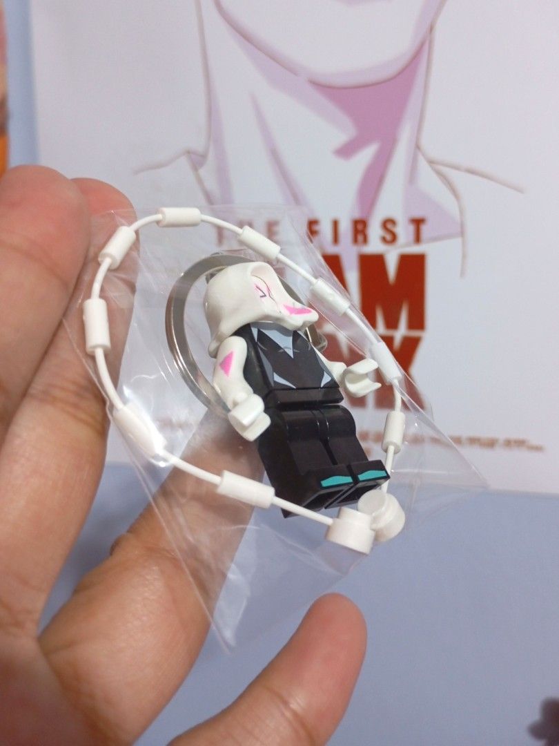 Lego Ghost-Spider Gwen Stacy mini figure keychain (Category: Character Goods) located in Quezon City. Submitted by ana-chan (Listing ID 1403960495, Image 2). Description: Lego Spider-Gwen keychain is a must-have for any Marvel fan! It features a detailed Spider-Gwen minifigure attached to a keyring. The keychain also includes a white, circular design. Perfect for adding a touch of superhero flair to your keys, bag, or backpack..