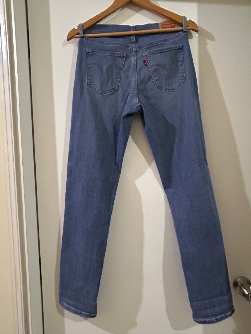 Levi's 312 Shaping Slim Jeans - Size 28 (Category: Jeans) located in Taguig. Submitted by 63collective (Listing ID 1403918927, Image 2). Description: Levi's 312 Shaping Slim jeans in a classic blue wash. Features the iconic Levi's red tab and back pocket design. Size 28. The jeans have a slim fit and are designed for a flattering silhouette. Made from denim material. Perfect for everyday wear. Soft and super comfortable, made to flatter your figu