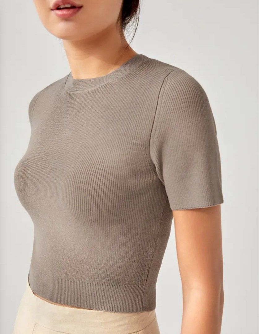 Love Bonito Ribbed Crop Top (Category: Shirts) located in Makati City. Submitted by secondavenue_ (Listing ID 1403811887, Image 1). Description: - Ribbed crop top - Color: Taupe - Features a crew neck - Short sleeves - Cropped length - Knit material - Available in US 2 - Never used but it comes with no tag .