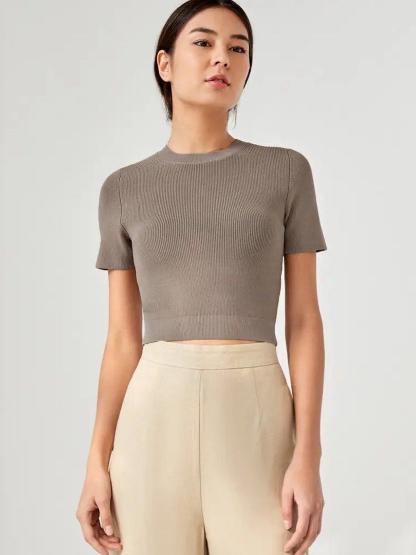Love Bonito Ribbed Crop Top (Category: Shirts) located in Makati City. Submitted by secondavenue_ (Listing ID 1403811887, Image 2). Description: - Ribbed crop top - Color: Taupe - Features a crew neck - Short sleeves - Cropped length - Knit material - Available in US 2 - Never used but it comes with no tag .