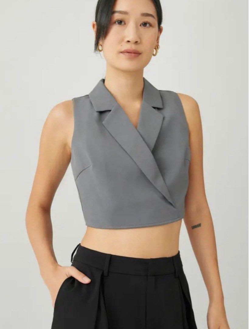 Love, Bonito Sleeveless Blazer Top (Category: Sleeveless) located in Makati City. Submitted by secondavenue_ (Listing ID 1403869074, Image 1). Description: - Love, Bonito sleeveless blazer top - Gray color - Cropped design - Notched lapel - Back zipper closure - Size tag visible in photos - Dress up or down - Never used, just washed it only! .