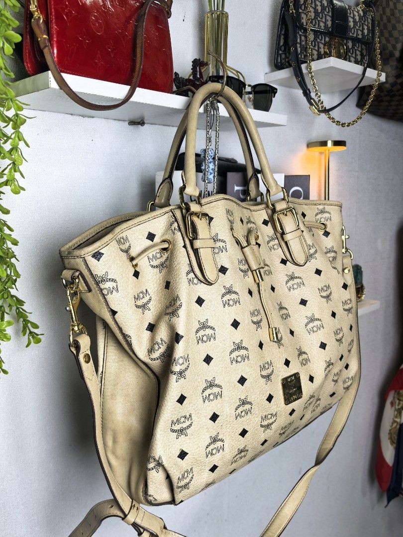 Mcm monogam 2 way handbag (Category: Luxury Bags & Wallets) located in Baguio. Submitted by ashzachary (Listing ID 1403968485, Image 3). Description: Mcm monogam 2 way handbag Condition :Excellent condition Color rate 10/10 Size : Medium Sign of use only see last 2 pic Super ganda sa personal Pm. More details Good quality Plsss 📌No Bogus 📌No return MOP What you see is what you get PALAWAN, CEBUNA GCASH AND BDO Reminder😊 We're selling thrifted 