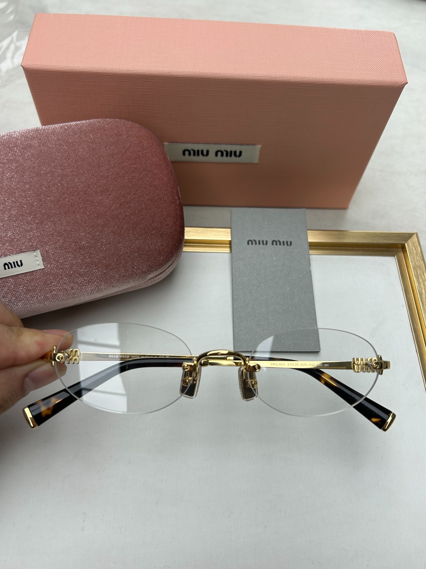 MiuMiu's new rimless glasses SMU A54S, Men's Fashion, Watches ...