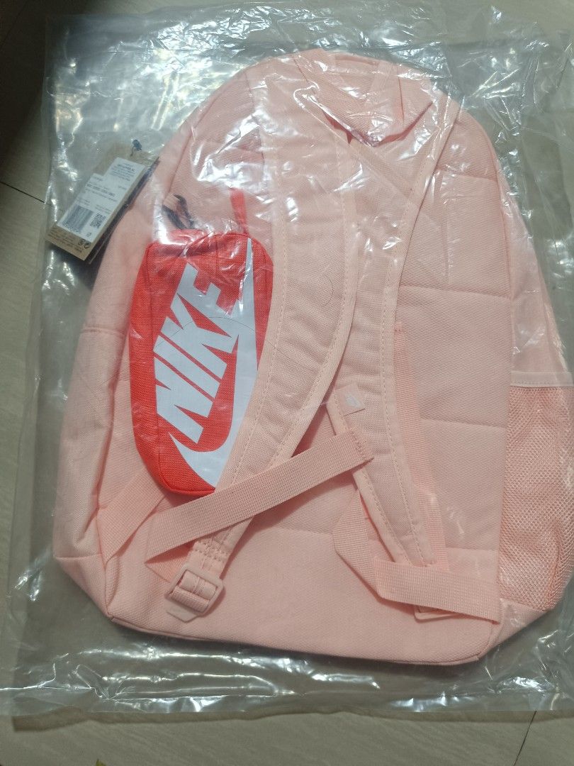 Nike Backpack (Category: Backpacks) located in Cavite. Submitted by disyc (Listing ID 1403893082, Image 3). Description: Nike Elemental backpack is available in two colors: black and peach. It features the iconic Nike logo prominently displayed. It has a spacious main compartment and side pockets for extra storage. Perfect for school, travel, or everyday use. 1299 each Meet up, lalamove, ship. .