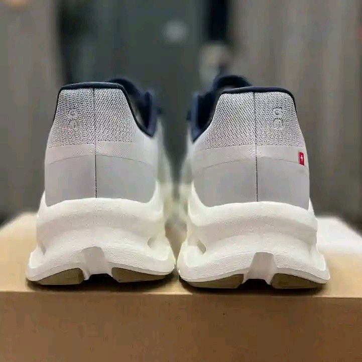 On CloudTec Sneakers (Category: Sneakers) located in Makati City. Submitted by wander-kicks (Listing ID 1403818440, Image 2). Description: - On CloudTec sneakers - Unique design with breathable upper - Neutral color scheme with blue accents - CloudTec technology for cushioning and support.