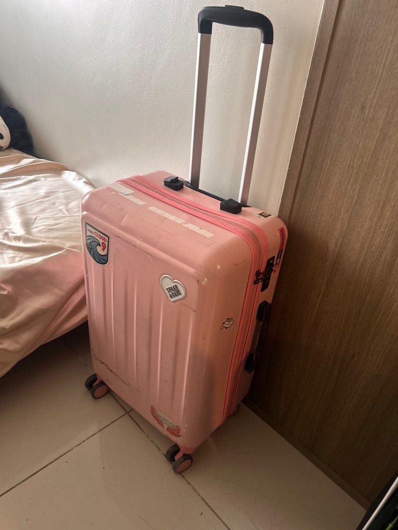 Pink Suitcase / Luggage (Category: Luggage) located in Pinamalayan. Submitted by _dragonfly (Listing ID 1403889680, Image 1). Description: Bought from Japan 4 years ago. Japan Mall quality RFS: hindi na nagagamit Issues: - madumi need linisan - scratches - stickers and sticker residue - broken yung top handle - mahirap itaas baba yung handle .