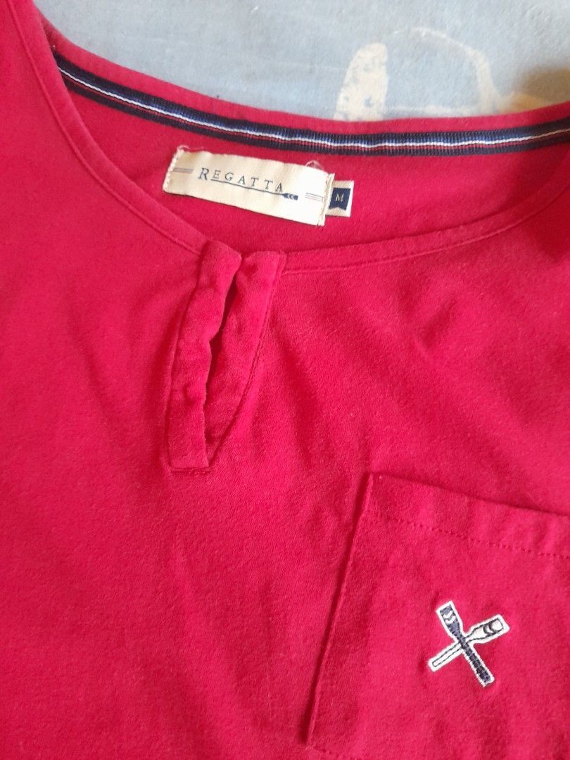 Regatta Red blouse with Pocket (Category: Blouses) located in San Pedro. Submitted by JohnsonKeeps (Listing ID 1403867547, Image 3). Description: - Red Regatta blouse shirt - Features a small front pocket with logo - Henley neckline - Medium size Chest width = 17 inches (laid flat) Cuff = 11 inches Armpit = 6.5 inches (laid flat) - Short sleeves - Material: Cotton/Polyester blend.