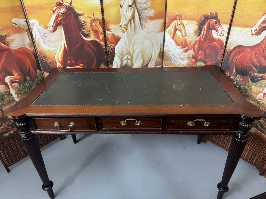Solid wood study table (Category: Tables & Sets) located in Singapore. Submitted by pmspl (Listing ID 1403880860, Image 1). Description: Dimensions: 125cm (L) x 65cm (W) x 74cm (H) This pre-loved solid wood study table is sturdy and stylish, perfect for student rooms, or work-from-home setups 1. Solid wood – strong and build to last 2. Clean, minimalist design 3. Spacious tabletop – great for laptops, books, and more 4. Compact size that does not